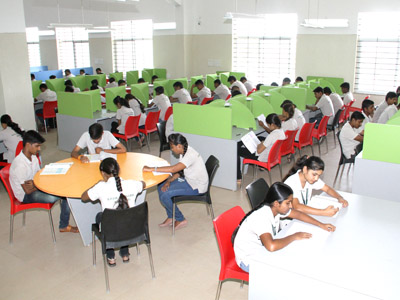 Students studying in the library reading hall